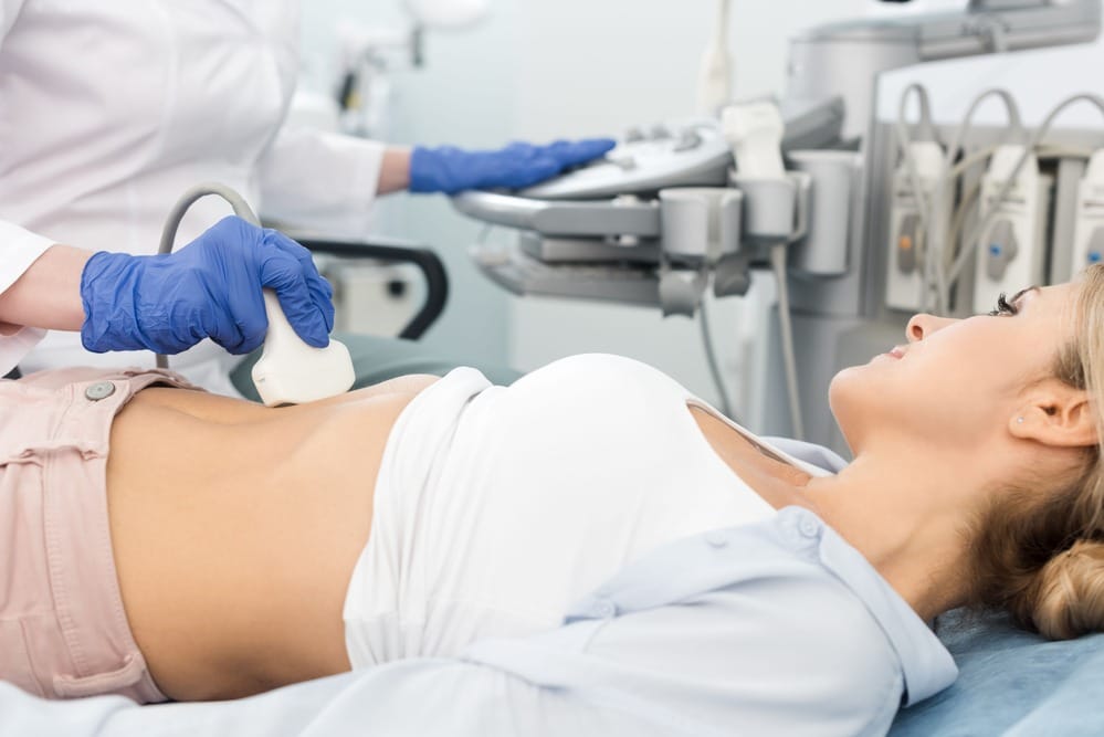 Patient having abdominal scan in London